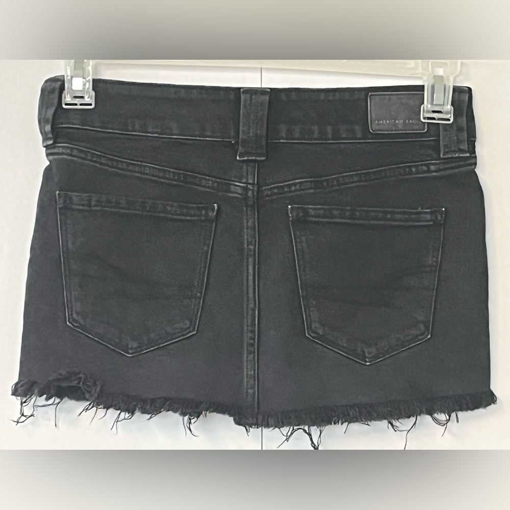 American Eagle black factory distressed jean skirt. Size 00 - Picture 5 of 10